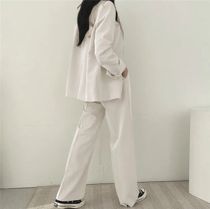 Set für Damen: Longblazer und gerade Hose